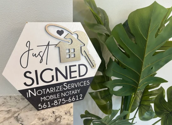 Freshly signed legal documents by a mobile notary in Florida.