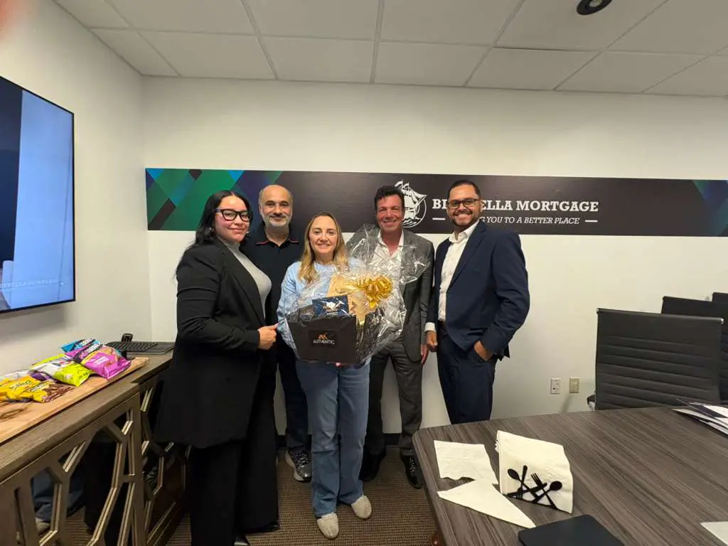 Notary signing agent assisting clients during a real estate closing in Davenport, Florida