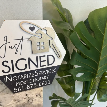 Freshly signed legal documents by a mobile notary in Florida.